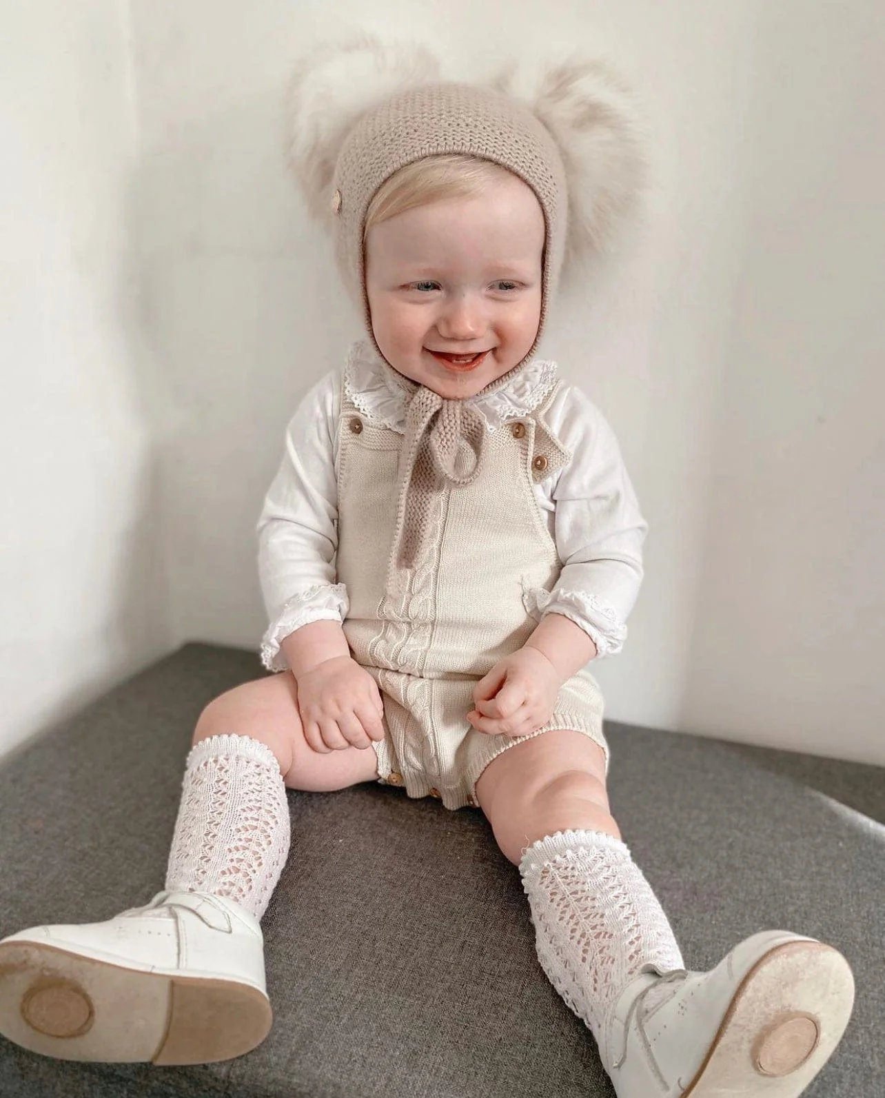 Honeycomb Beige Cashmere Bonnet with White Print Poms - Image 6